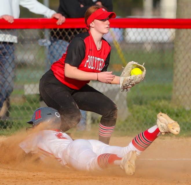 Polytech's Gabrielle Bogdon takes a flip to third for the final out of the sixth inning, getting Smyrna's Ryann Durnall on a force in Polytech's 8-3 win at Smyrna High School, Thursday, April 18, 2024.