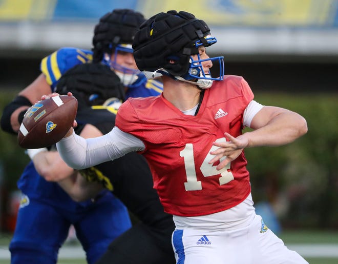 Delaware quarterback Ryan O'Connor throws a deep pass during the Blue and White Spring Game at Delaware Stadium, Friday, April 19, 2024.