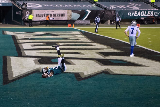 Eagles' Rodney McLeod (23) falls into the end zone after a 53-yard fumble return to score late in the fourth quarter Sunday, Nov. 1, 2020, at Lincoln Financial Field. The Eagles defeated the Cowboys 23-9.